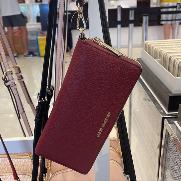MICHAEL KORS Leather Continental Wristlet Phone Case Wallet 
Dark Cherry 
NWT - Picture 11 of 15